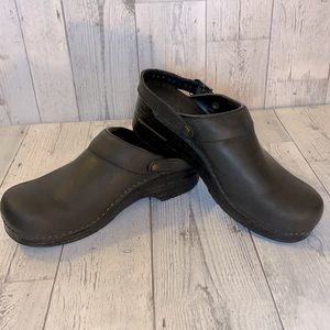 Dansko very gently used in good condition. No rips, tears or odors.